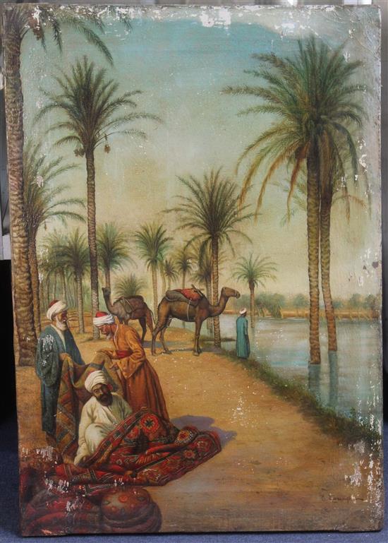 Enrico Tarenghi (Italian, 1848-1938) Arabs and camels beside the Nile, 31.5 x 22in., unframed